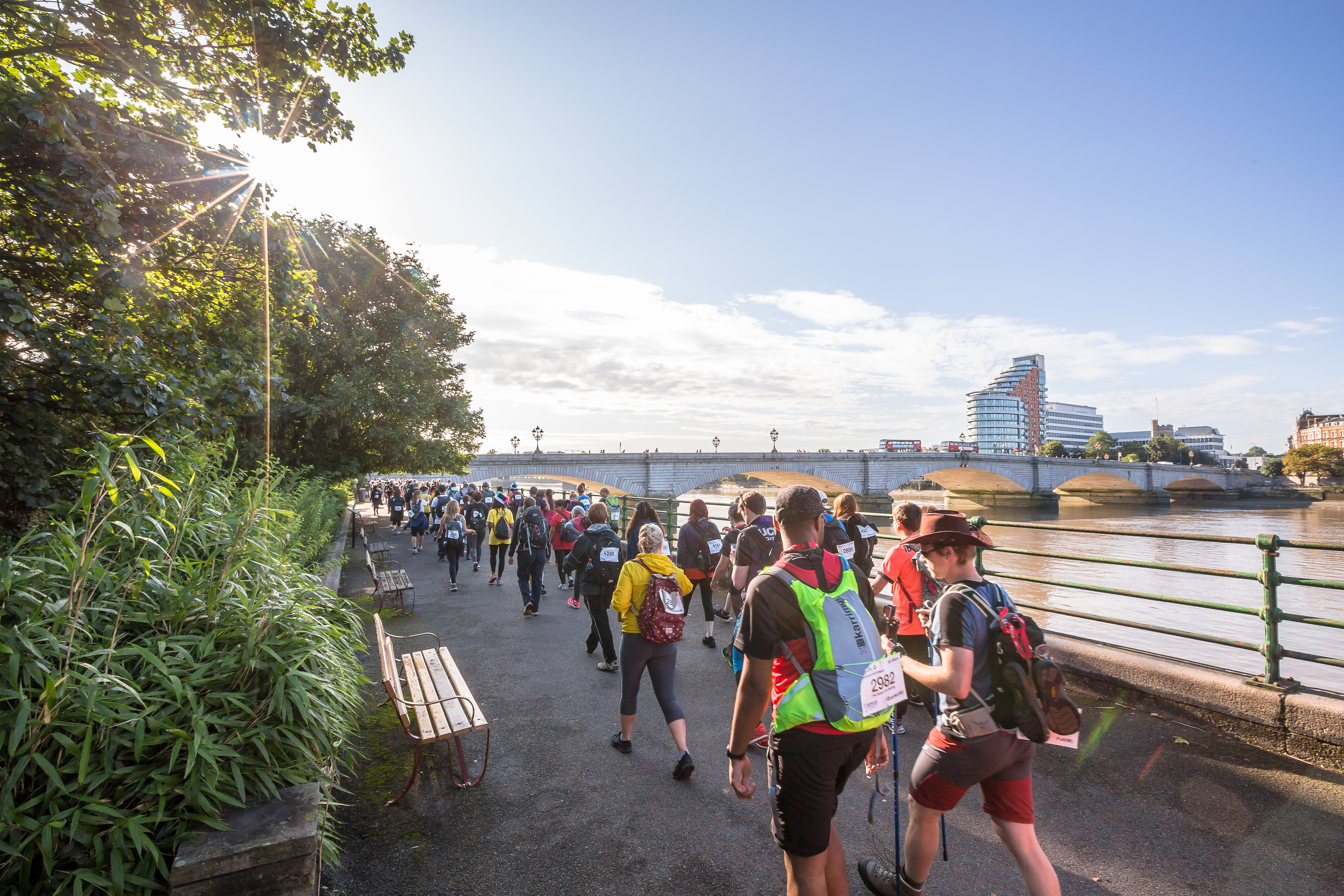 Walkers taking part in the Thames Path Ultra Challenge along the River Thames