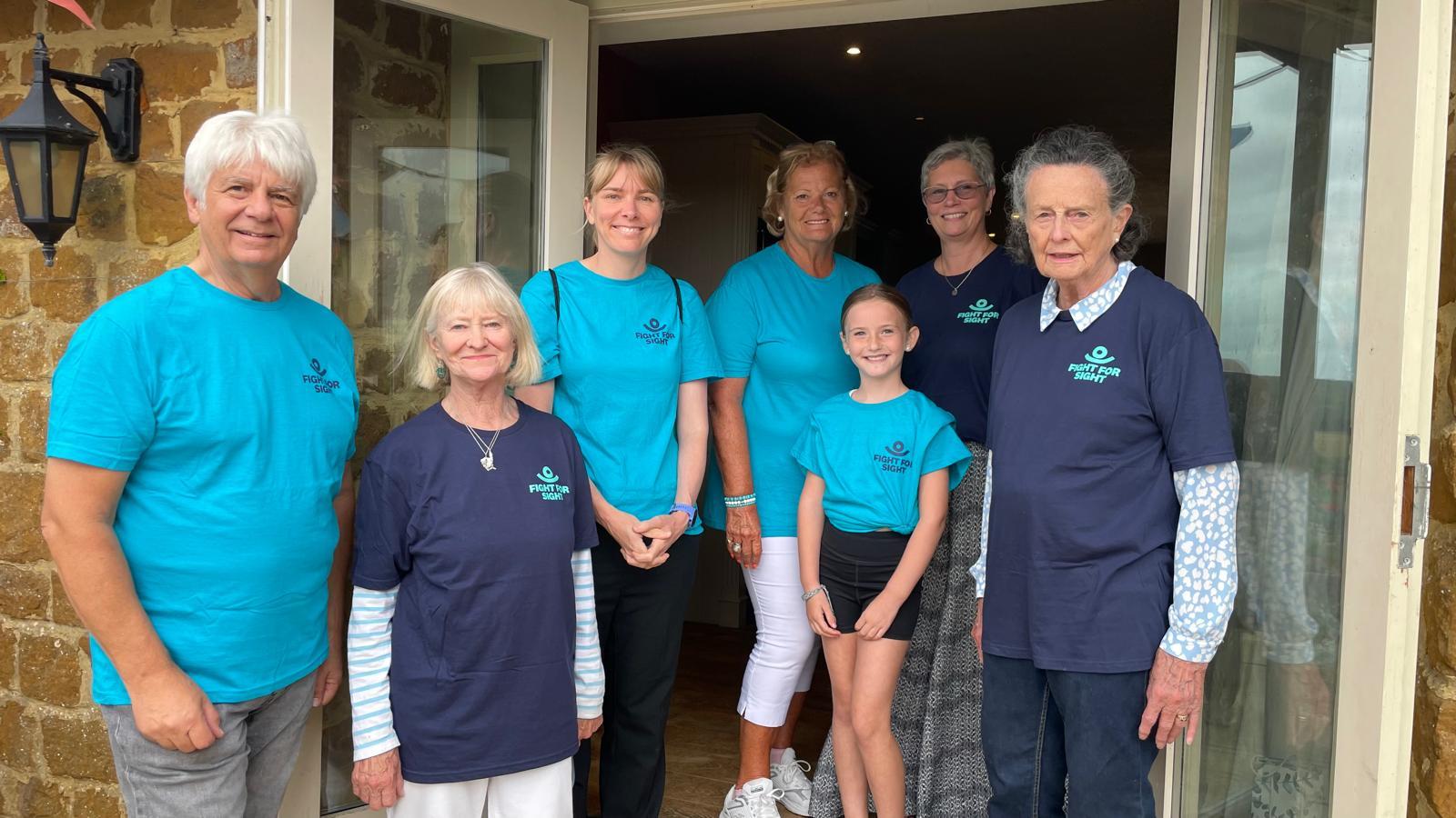 The Northamptonshire Committee team and helpers wearing Fight for Sight tops at the Garden Party