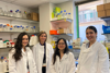 Professor van der Spuy with some of her team in the lab