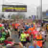 Runners taking part in the Manchester Marathon with lots of support from the crowds