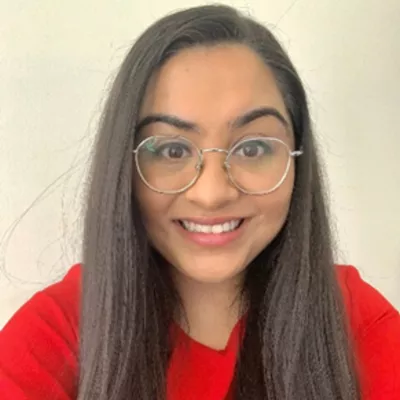 Headshot of Sonali Dave smiling
