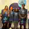 An image of six Fight for Sight fundraisers, wearing the Fight for Sight tabards, looking to camera and smiling.