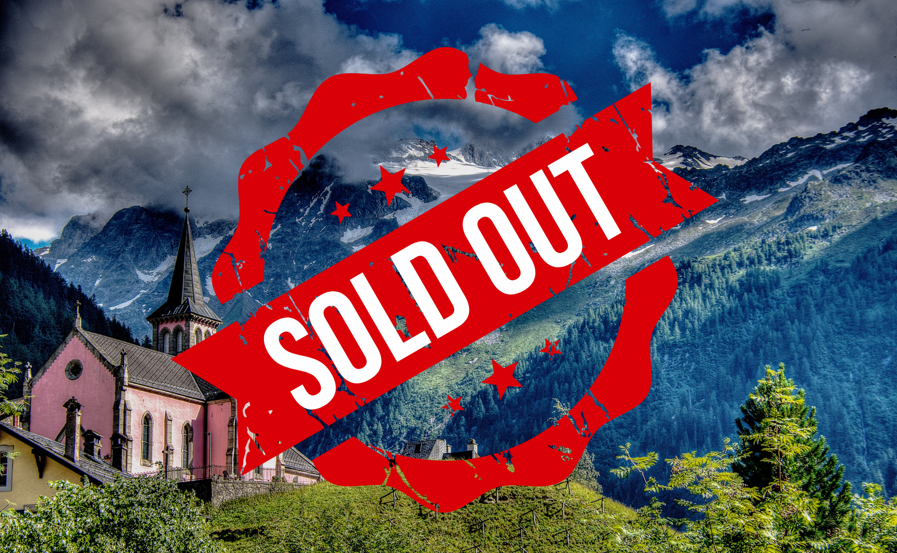 a photo of mountains in the alps, with a church on the left. there is a big red SOLD OUT banner across it,