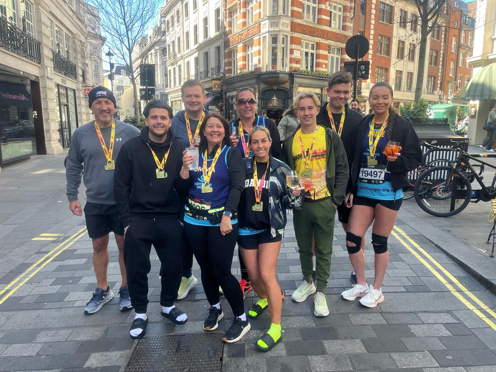 Team Tommy at the London Landmarks, posing with their medals after the race
