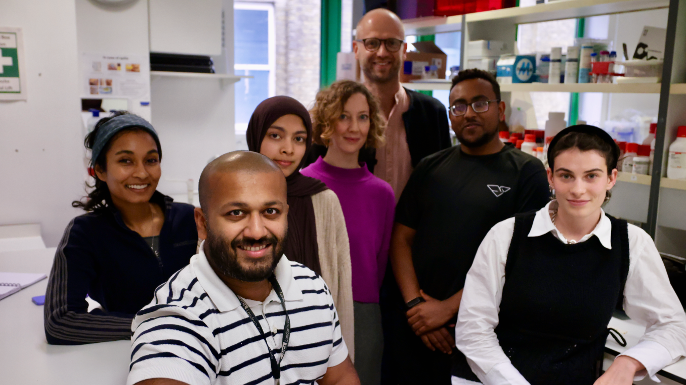 A group photo of early career researchers with Drs Matteo Rizzi and Kate Powell 