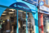 West Norwood Fight for Sight Charity Shop, a turquoise exterior with our navy logo and the words Save Sight. Change Lives.