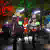 People taking part in the Halloween Walk in a dark night with illuminated clothing and lights