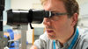 Professor Pearse Keane using an eye scanner