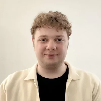 A headshot of Callum Hunt.