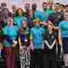 A group of people all wearing Fight for Sight t-shirts