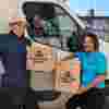 Fight for Sight House Clearance team, two men and a lady in Fight for Sight tshirts, with our Fight for Sight collections van
